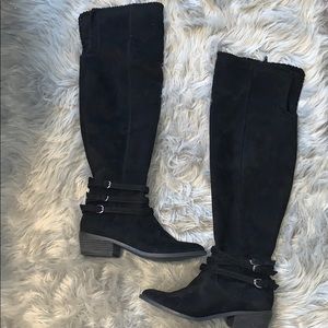 Buckle over the knee boots.